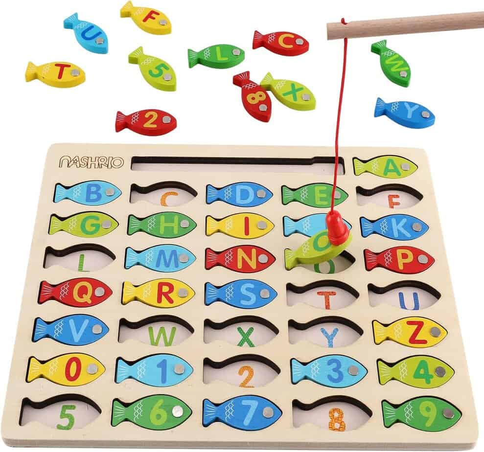 A wooden fishing game with colorful Squigz-inspired fish pieces labeled with letters and numbers, a magnetic fishing rod, and a wooden board with cutouts for matching the fish.