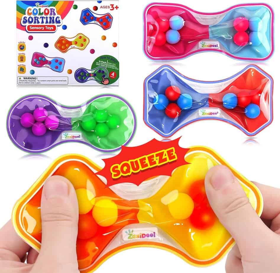 Colorful sensory toys for kids are shown. One is being squeezed by two hands. The toys are shaped like hourglasses with colored balls inside. Packaging says "Color Sorting Sensory Toys" and is labeled for ages 3 and up.