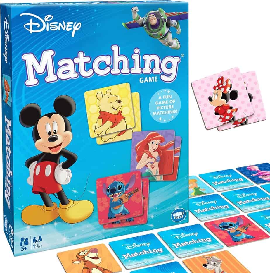 A Disney Matching Game box features Mickey Mouse, with cards showing Winnie the Pooh, Ariel, Minnie Mouse, and Stitch. Other cards are spread out, encouraging early skills like memory and sentence building. Buzz Lightyear appears at the top right of the box.