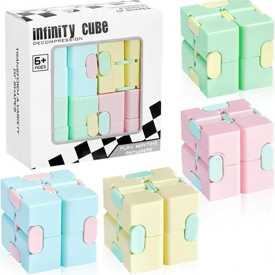 Pastel-colored Infinity Cubes in pink, blue, yellow, and green are displayed around their packaging box, which is labeled "Infinity Cube" and suitable for ages 6 and up.