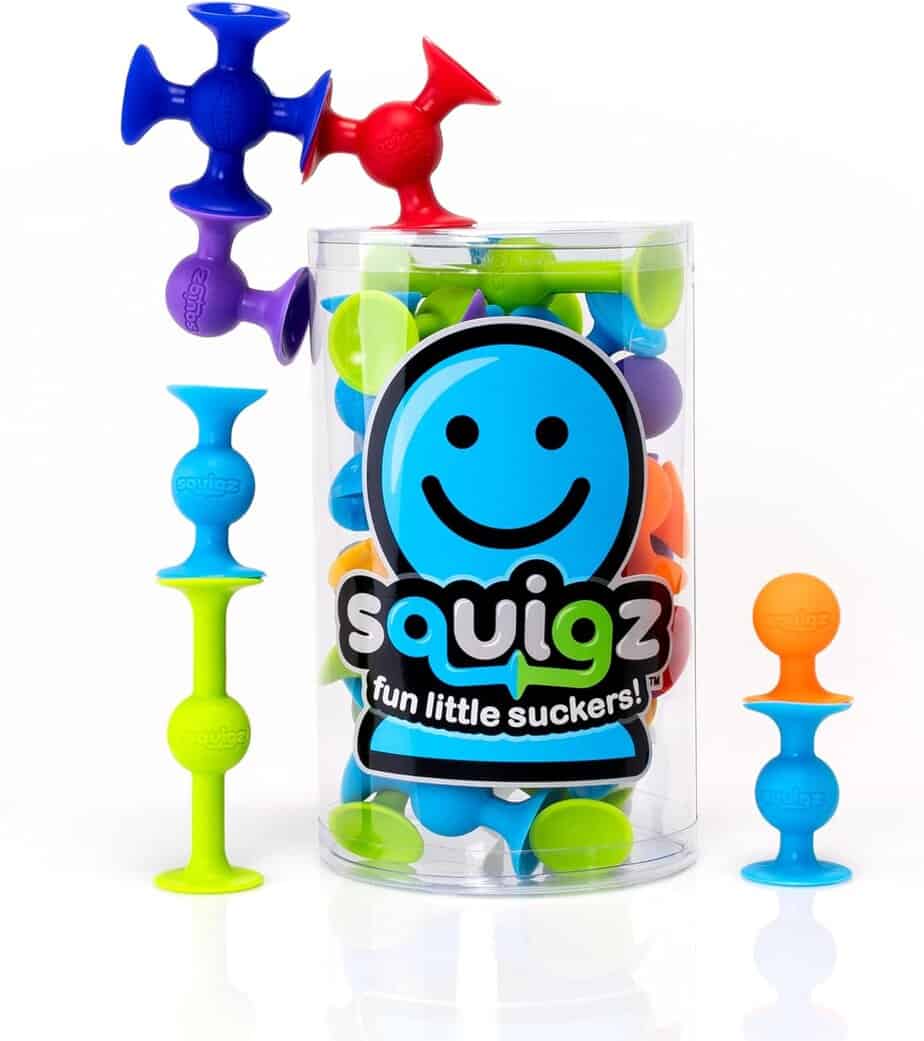 A clear container labeled "Squigz fun little suckers!" with colorful suction-cup toys in blue, green, orange, purple, and red, perfect for creative play or sound sorting activities inspired by Say-a-Sound or Sorting Sharks.